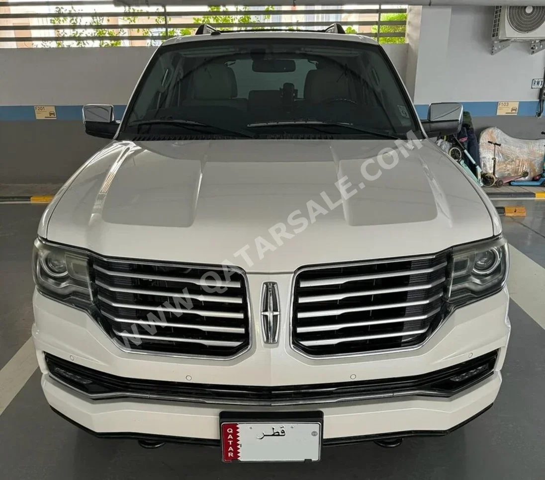 Lincoln  Navigator  2015  Automatic  34,450 Km  6 Cylinder  Four Wheel Drive (4WD)  SUV  White  With Warranty