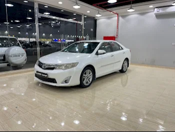 Toyota  Camry  GLX  2014  Automatic  213,000 Km  4 Cylinder  Front Wheel Drive (FWD)  Sedan  White