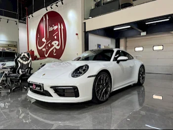  Porsche  911  Carrera  2022  Automatic  32,000 Km  6 Cylinder  Rear Wheel Drive (RWD)  Coupe / Sport  White  With Warranty
