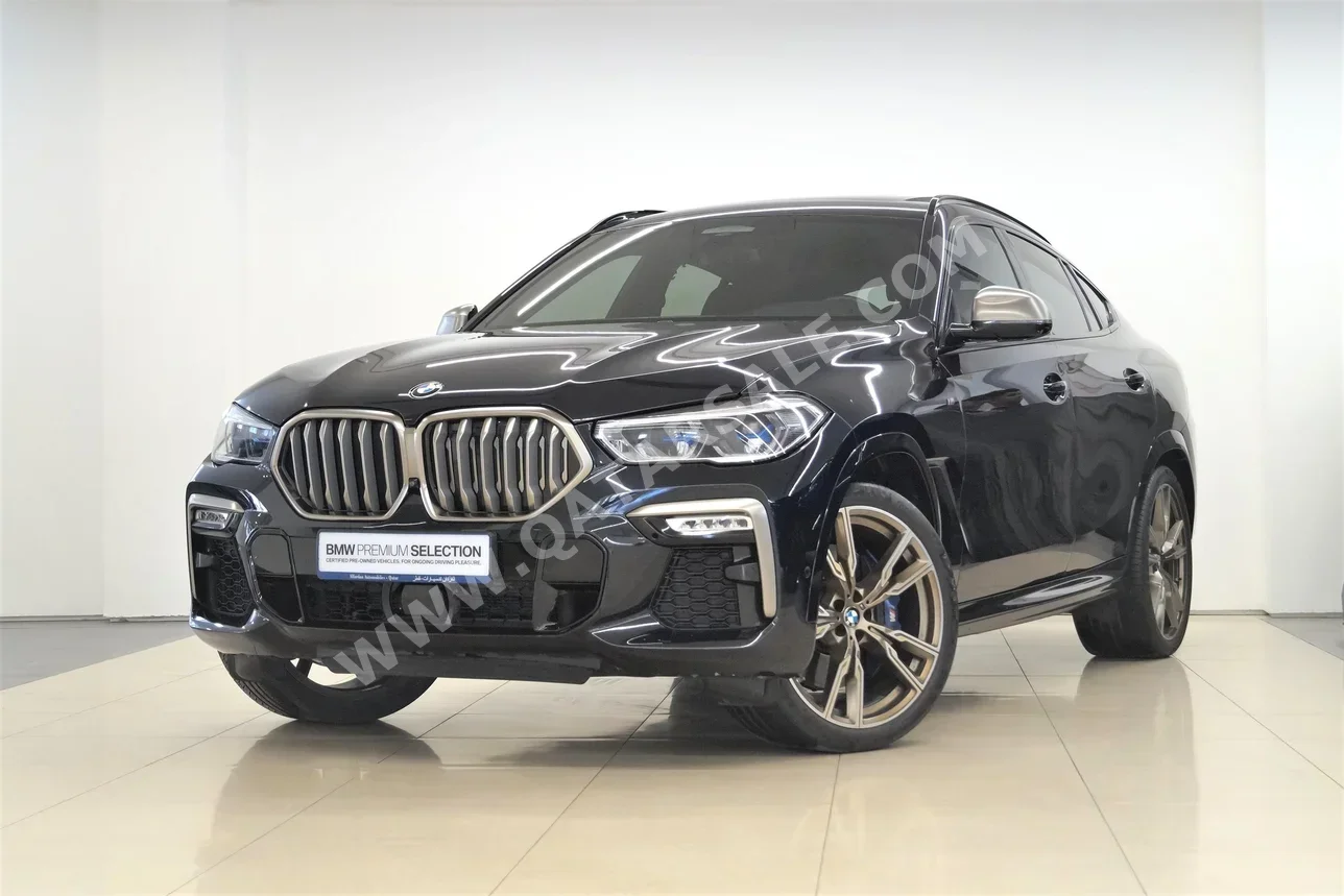 BMW  X-Series  X6 M50i  2020  Automatic  48,600 Km  8 Cylinder  Four Wheel Drive (4WD)  SUV  Black  With Warranty