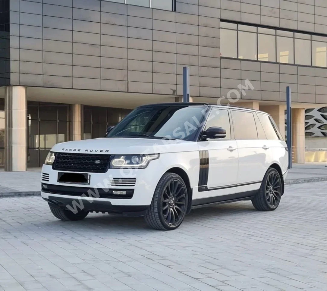 Land Rover  Range Rover  Vogue SE Super charged  2015  Automatic  150,000 Km  8 Cylinder  All Wheel Drive (AWD)  SUV  White