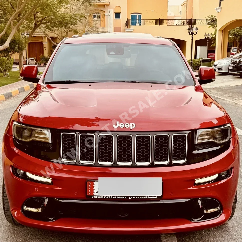 Jeep  Grand Cherokee  SRT  2016  Automatic  120,000 Km  8 Cylinder  Four Wheel Drive (4WD)  SUV  Maroon and Black