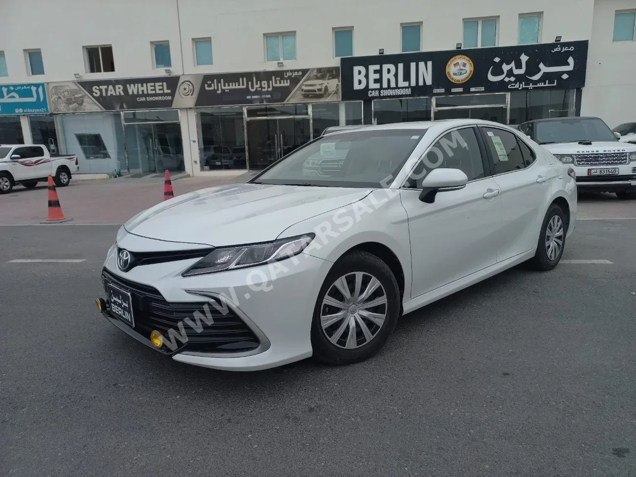Toyota  Camry  LE  2023  Automatic  28,000 Km  4 Cylinder  Front Wheel Drive (FWD)  Sedan  White  With Warranty