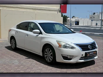 Nissan  Altima  2013  Automatic  222,000 Km  4 Cylinder  Front Wheel Drive (FWD)  Sedan  White