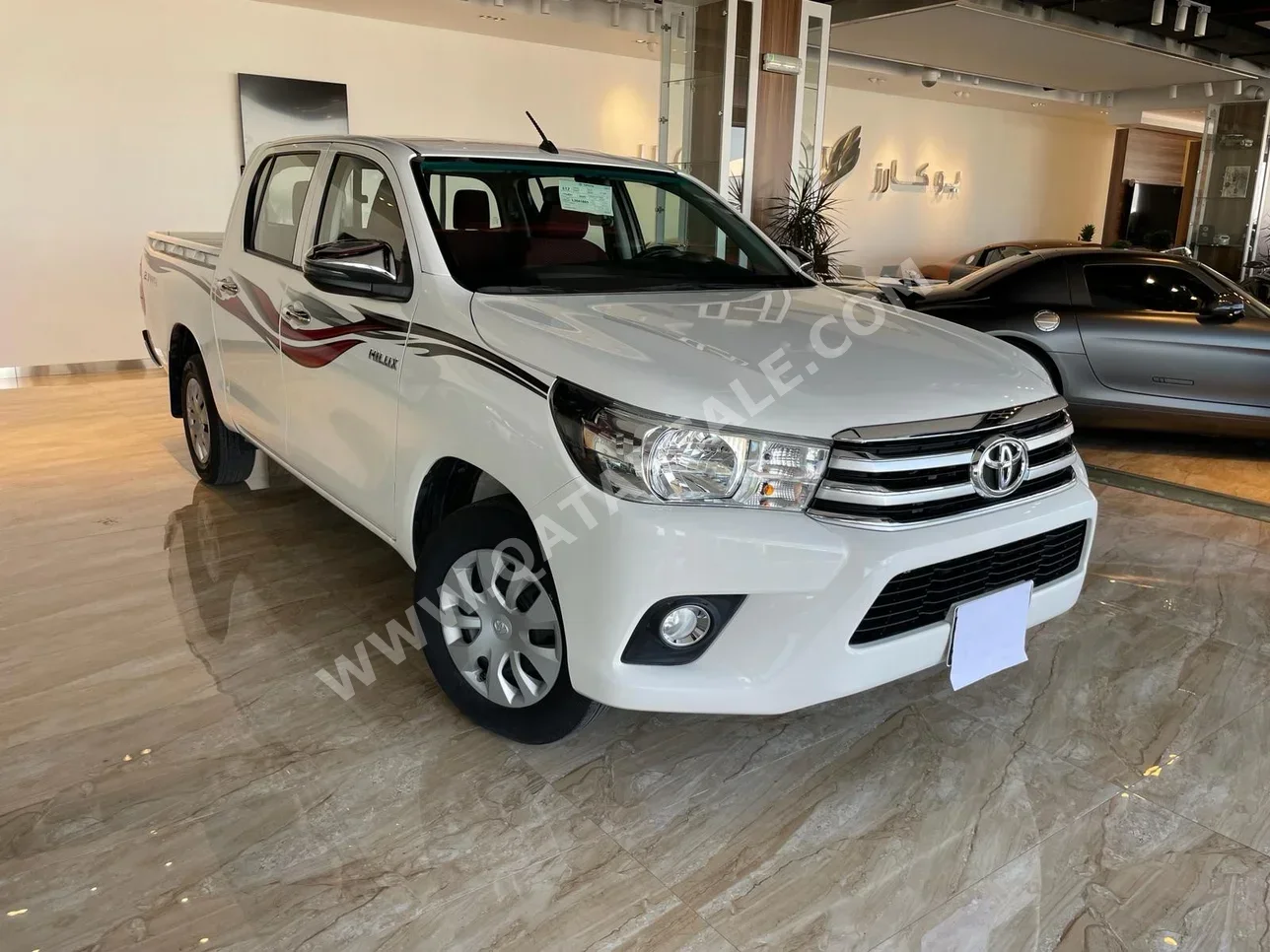 Toyota  Hilux  2020  Automatic  29,000 Km  4 Cylinder  Rear Wheel Drive (RWD)  Pick Up  White