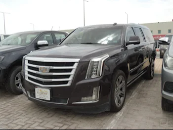 Cadillac  Escalade  2015  Automatic  86,000 Km  8 Cylinder  Four Wheel Drive (4WD)  SUV  Brown