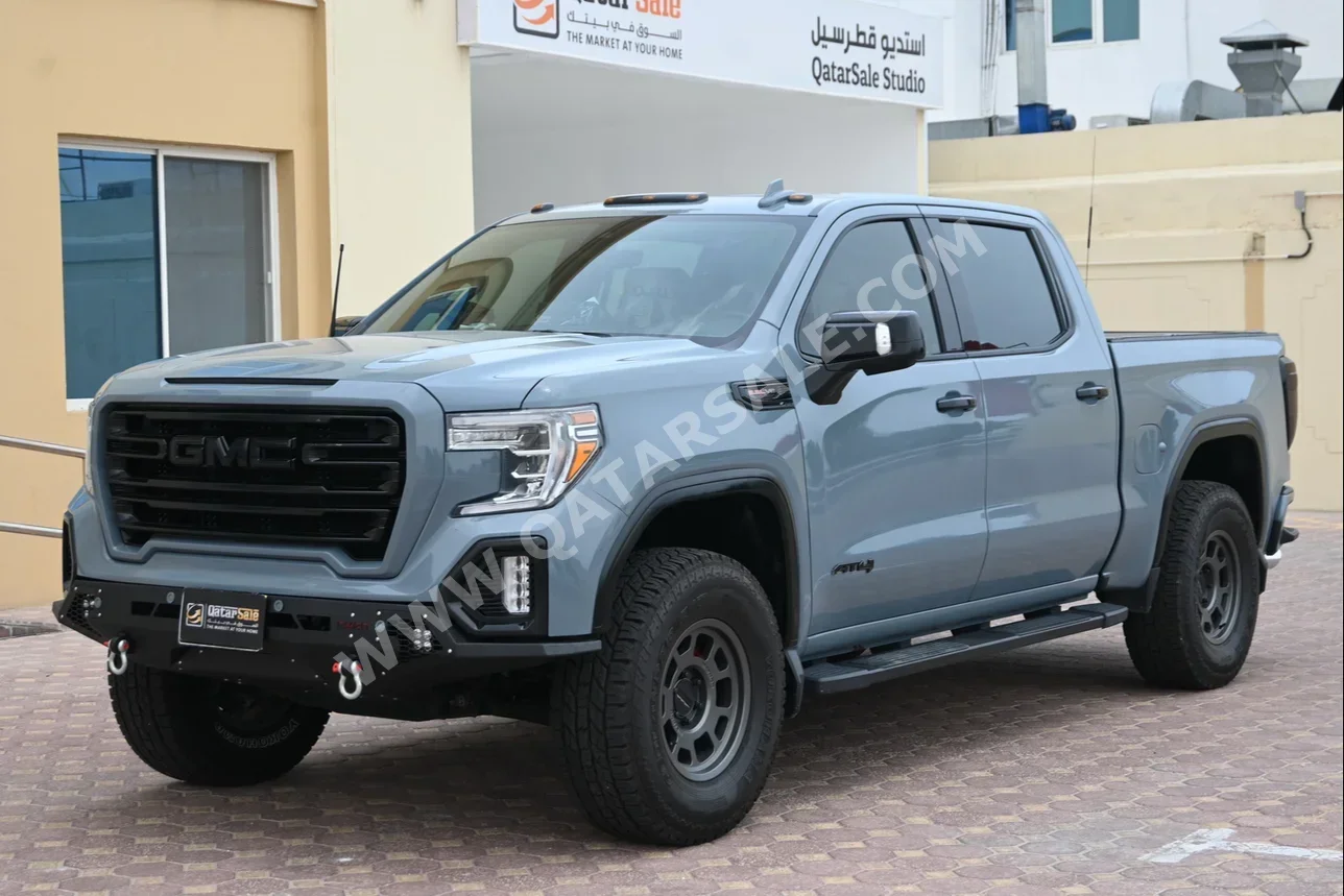 GMC  Sierra  AT4  2019  Automatic  117,500 Km  8 Cylinder  Four Wheel Drive (4WD)  Pick Up  Gray