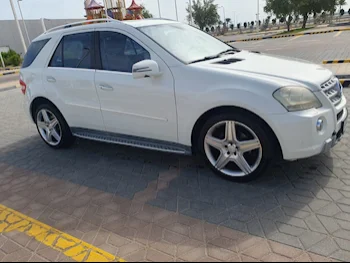 Mercedes-Benz  ML  350  2011  Automatic  129,000 Km  6 Cylinder  Four Wheel Drive (4WD)  SUV  White