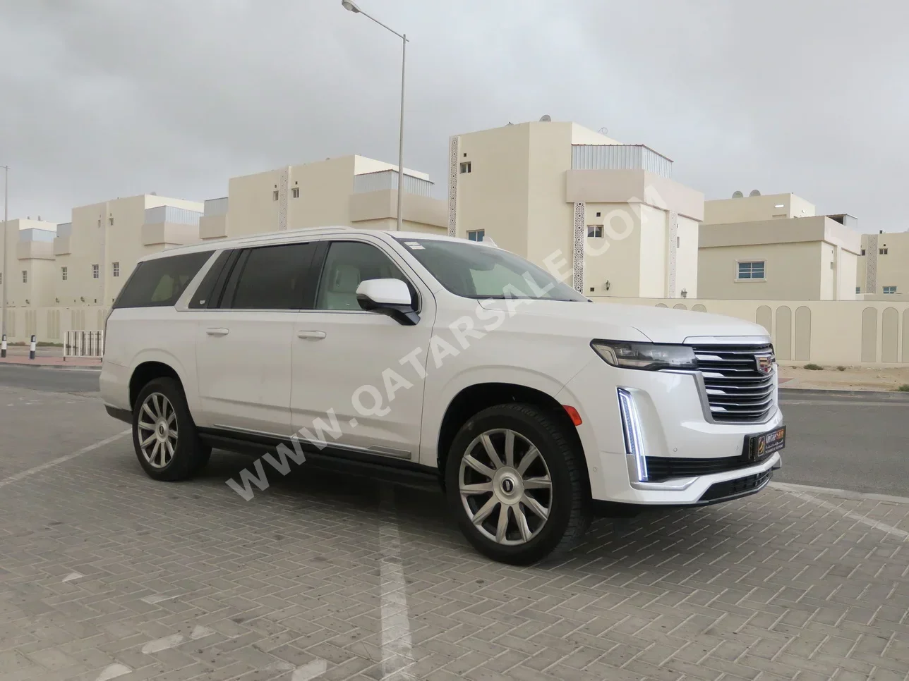 Cadillac  Escalade  Platinum  2021  Automatic  73,000 Km  8 Cylinder  Four Wheel Drive (4WD)  SUV  White  With Warranty