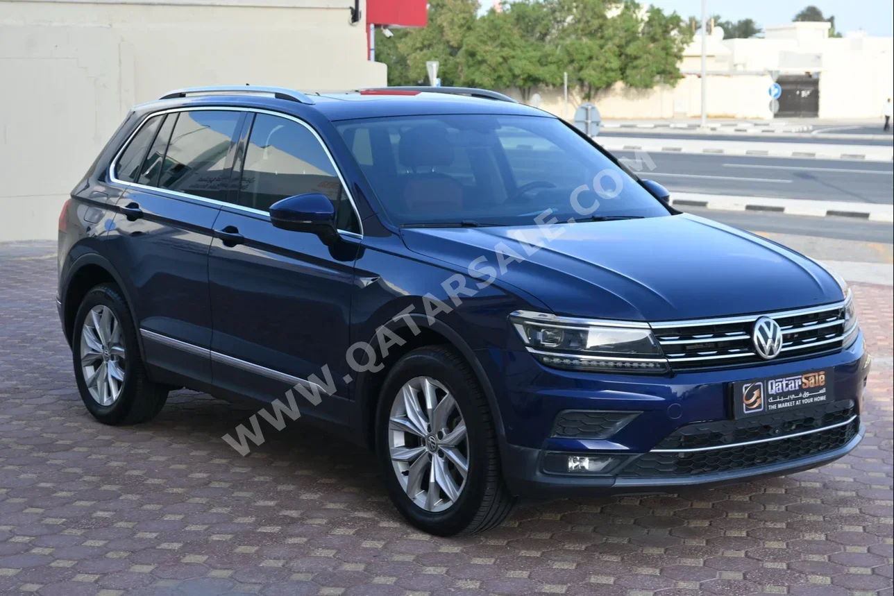  Volkswagen  Tiguan  Elegance  2018  Automatic  61,500 Km  4 Cylinder  All Wheel Drive (AWD)  SUV  Blue  With Warranty