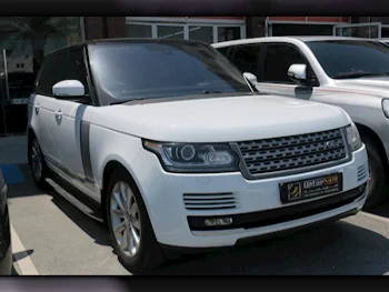 Land Rover  Range Rover  HSE  2014  Automatic  169,000 Km  8 Cylinder  Four Wheel Drive (4WD)  SUV  Off White