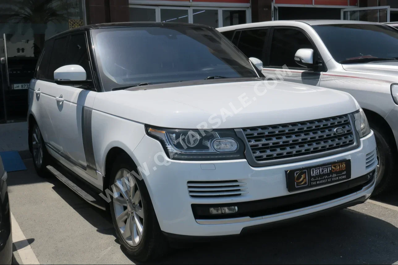 Land Rover  Range Rover  HSE  2014  Automatic  169,000 Km  8 Cylinder  Four Wheel Drive (4WD)  SUV  Off White