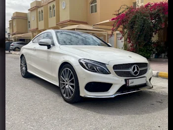 Mercedes-Benz  C-Class  300 AMG  2016  Automatic  100,000 Km  4 Cylinder  Rear Wheel Drive (RWD)  Coupe / Sport  White