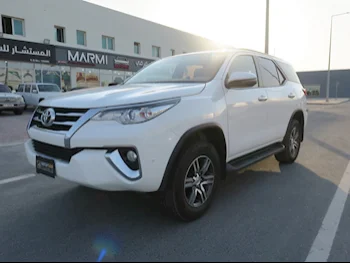 Toyota  Fortuner  2018  Automatic  115,000 Km  4 Cylinder  Four Wheel Drive (4WD)  SUV  White
