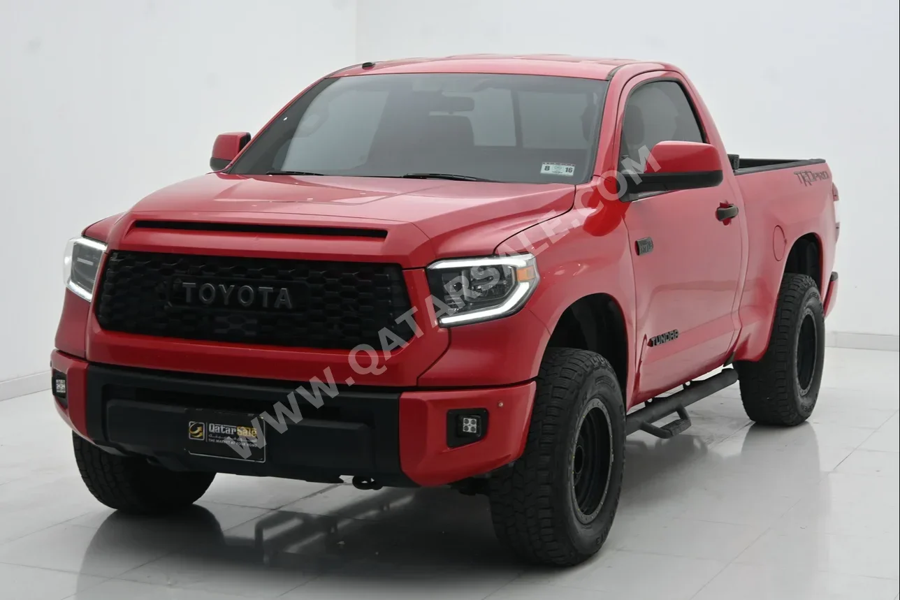 Toyota  Tundra  2011  Automatic  252,000 Km  8 Cylinder  Four Wheel Drive (4WD)  Pick Up  Red