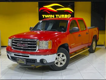 GMC  Sierra  SLE  2012  Automatic  136,000 Km  8 Cylinder  Four Wheel Drive (4WD)  Pick Up  Red