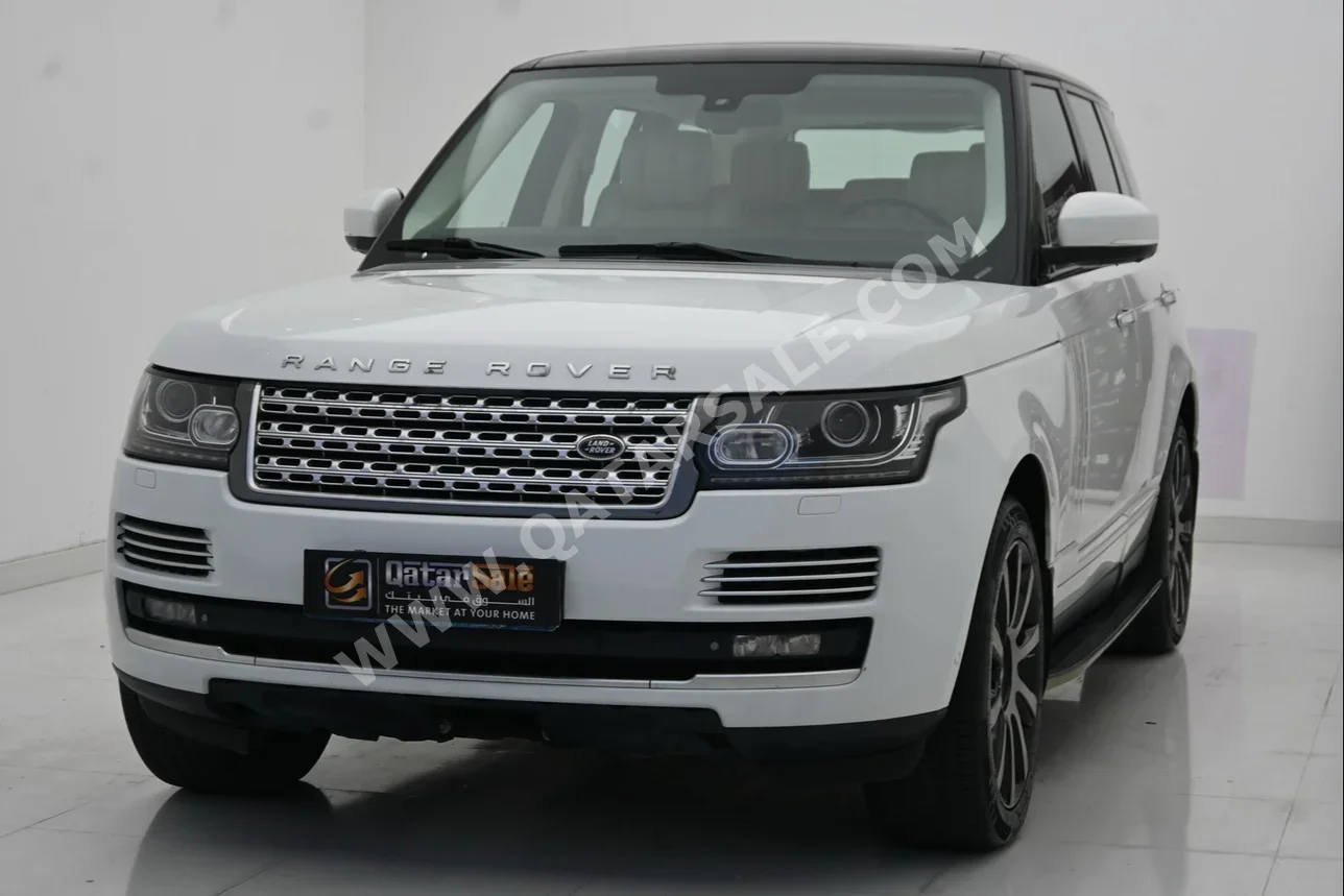 Land Rover  Range Rover  Vogue SE Super charged  2013  Automatic  168,000 Km  8 Cylinder  Four Wheel Drive (4WD)  SUV  White