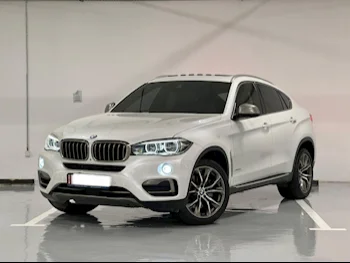  BMW  X-Series  X6  2015  Automatic  120,000 Km  8 Cylinder  Four Wheel Drive (4WD)  SUV  White  With Warranty