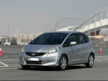 Honda  JAZZ  2014  Automatic  92,000 Km  4 Cylinder  Front Wheel Drive (FWD)  SUV  Silver