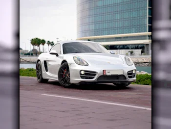 Porsche  Cayman  2015  Automatic  98,000 Km  6 Cylinder  Rear Wheel Drive (RWD)  Coupe / Sport  White