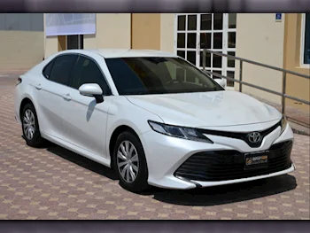 Toyota  Camry  LE  2019  Automatic  30,000 Km  4 Cylinder  Front Wheel Drive (FWD)  Sedan  White
