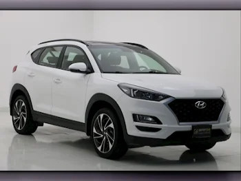 Hyundai  Tucson  Limited  2021  Automatic  37,930 Km  4 Cylinder  Four Wheel Drive (4WD)  SUV  White  With Warranty