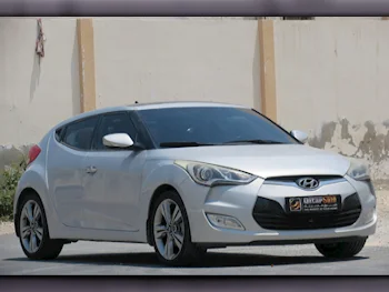 Hyundai  Veloster  2016  Automatic  20,000 Km  4 Cylinder  Front Wheel Drive (FWD)  Hatchback  Gray  With Warranty