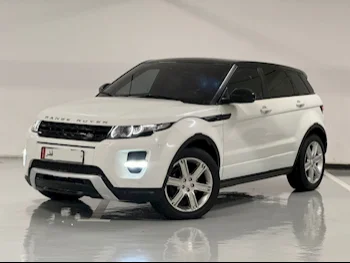 Land Rover  Evoque  2015  Automatic  99,000 Km  4 Cylinder  Four Wheel Drive (4WD)  SUV  White