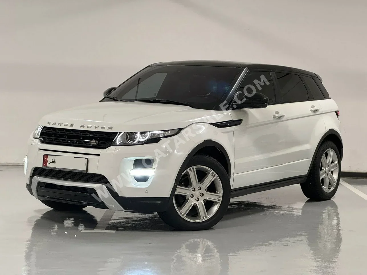 Land Rover  Evoque  2015  Automatic  99,000 Km  4 Cylinder  Four Wheel Drive (4WD)  SUV  White