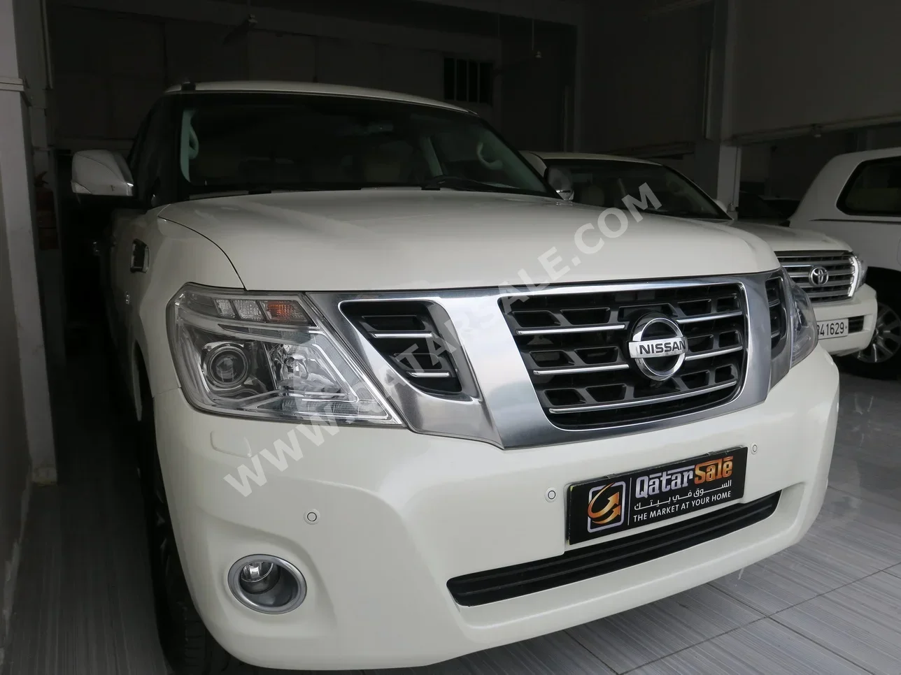Nissan  Patrol  Platinum  2015  Automatic  223,000 Km  8 Cylinder  Four Wheel Drive (4WD)  SUV  White