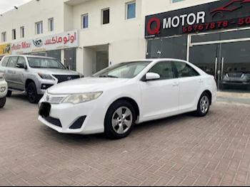 Toyota  Camry  GL  2014  Automatic  265,000 Km  4 Cylinder  Front Wheel Drive (FWD)  Sedan  White