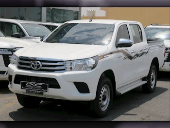 Toyota  Hilux  2024  Automatic  3,000 Km  4 Cylinder  Four Wheel Drive (4WD)  Pick Up  White  With Warranty