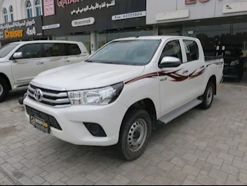 Toyota  Hilux  2022  Automatic  64,000 Km  4 Cylinder  Four Wheel Drive (4WD)  Pick Up  White  With Warranty