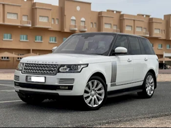 Land Rover  Range Rover  Vogue Super charged  2014  Automatic  182,000 Km  8 Cylinder  Four Wheel Drive (4WD)  SUV  White