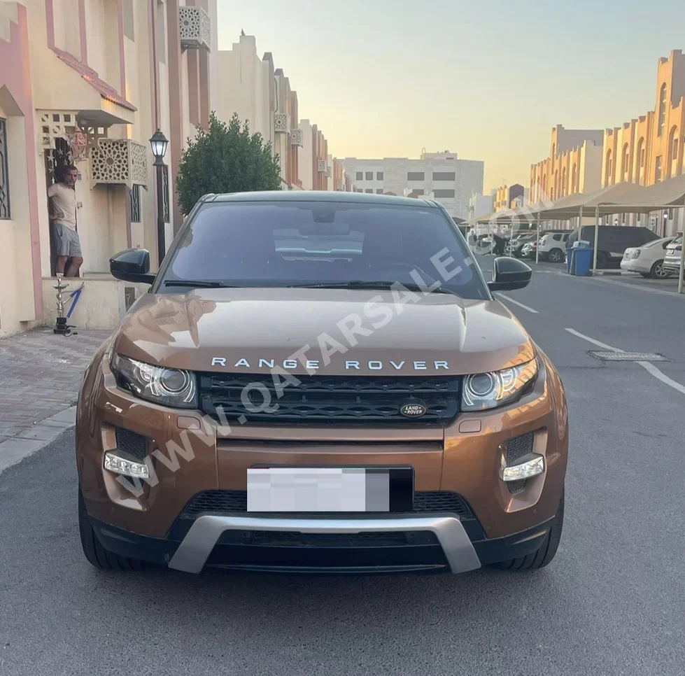 Land Rover  Evoque  Prestige  2015  Automatic  66,000 Km  4 Cylinder  Four Wheel Drive (4WD)  SUV  Brown