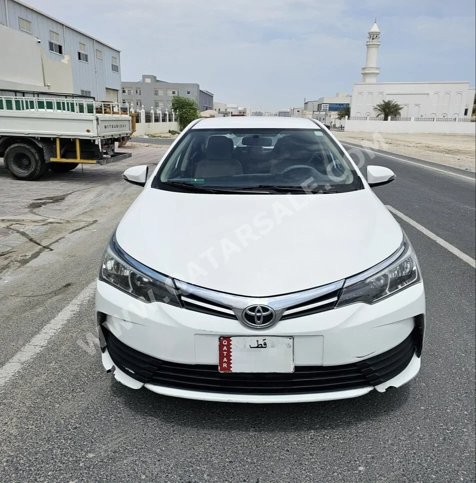 Toyota  Corolla  XLI  2017  Automatic  243,000 Km  4 Cylinder  Front Wheel Drive (FWD)  Sedan  White  With Warranty