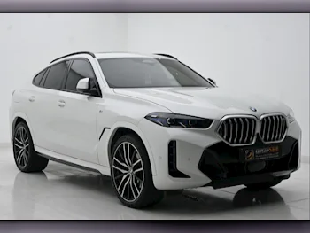 BMW  X-Series  X6 40i  2024  Automatic  11,900 Km  6 Cylinder  Four Wheel Drive (4WD)  SUV  White  With Warranty