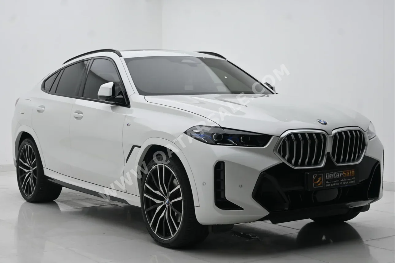 BMW  X-Series  X6 40i  2024  Automatic  11,900 Km  6 Cylinder  Four Wheel Drive (4WD)  SUV  White  With Warranty