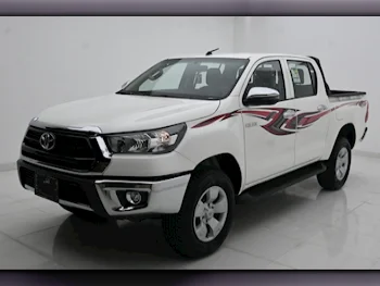 Toyota  Hilux  2023  Automatic  0 Km  4 Cylinder  Four Wheel Drive (4WD)  Pick Up  White  With Warranty