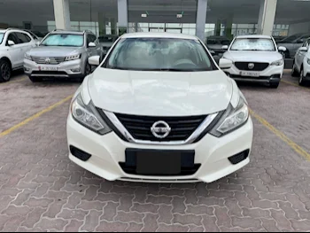 Nissan  Altima  2018  Automatic  42,000 Km  4 Cylinder  Front Wheel Drive (FWD)  Sedan  White