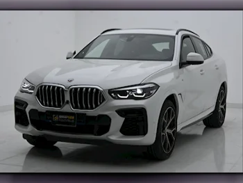 BMW  X-Series  X6 40i  2023  Automatic  8,000 Km  6 Cylinder  Four Wheel Drive (4WD)  SUV  White  With Warranty