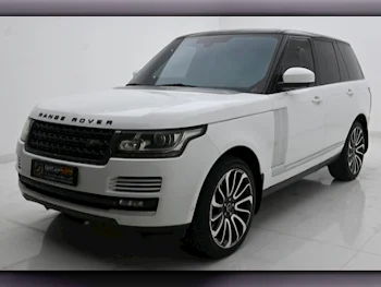  Land Rover  Range Rover  Vogue Super charged  2013  Automatic  184,000 Km  8 Cylinder  Four Wheel Drive (4WD)  SUV  White  With Warranty