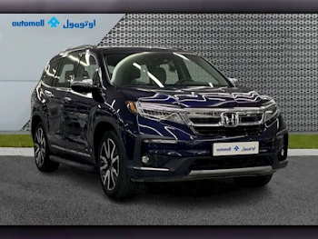 Honda  Pilot  Touring  2022  Automatic  33,160 Km  6 Cylinder  Four Wheel Drive (4WD)  SUV  Blue  With Warranty