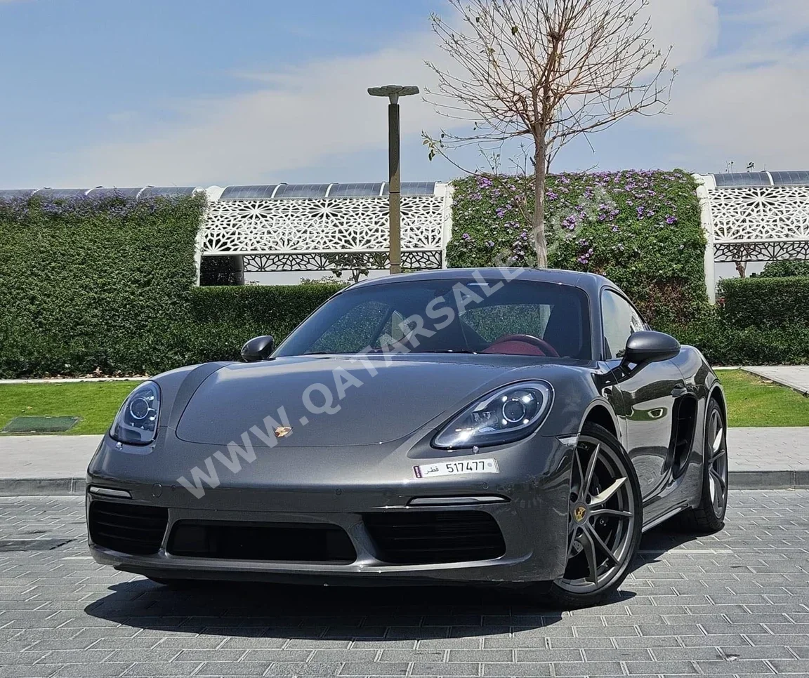 Porsche  Cayman  718  2020  Automatic  51,976 Km  4 Cylinder  Rear Wheel Drive (RWD)  Coupe / Sport  Gray  With Warranty