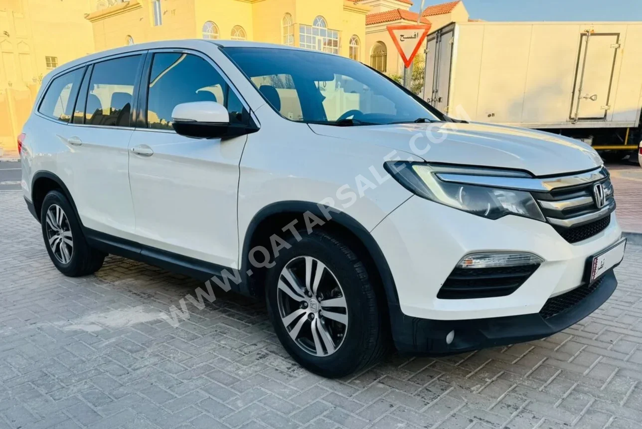 Honda  Pilot  EX  2016  Automatic  210,000 Km  6 Cylinder  Front Wheel Drive (FWD)  SUV  Off White