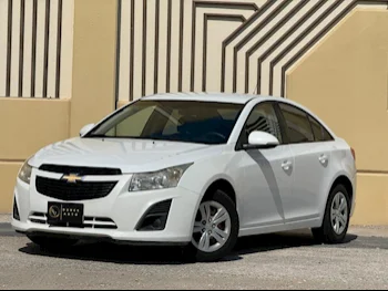 Chevrolet  Cruze  LS  2014  Automatic  74,000 Km  4 Cylinder  Front Wheel Drive (FWD)  Sedan  White