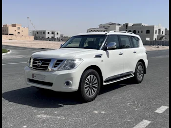 Nissan  Patrol  Platinum  2015  Automatic  159,000 Km  8 Cylinder  Four Wheel Drive (4WD)  SUV  White