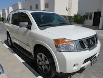 Nissan  Armada  LE  2011  Automatic  131,000 Km  8 Cylinder  Four Wheel Drive (4WD)  SUV  White