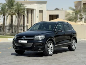 Volkswagen  Touareg  2012  Automatic  84,000 Km  6 Cylinder  All Wheel Drive (AWD)  SUV  Black