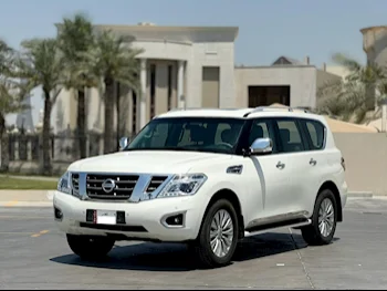 Nissan  Patrol  Platinum  2014  Automatic  214,000 Km  8 Cylinder  Four Wheel Drive (4WD)  SUV  White